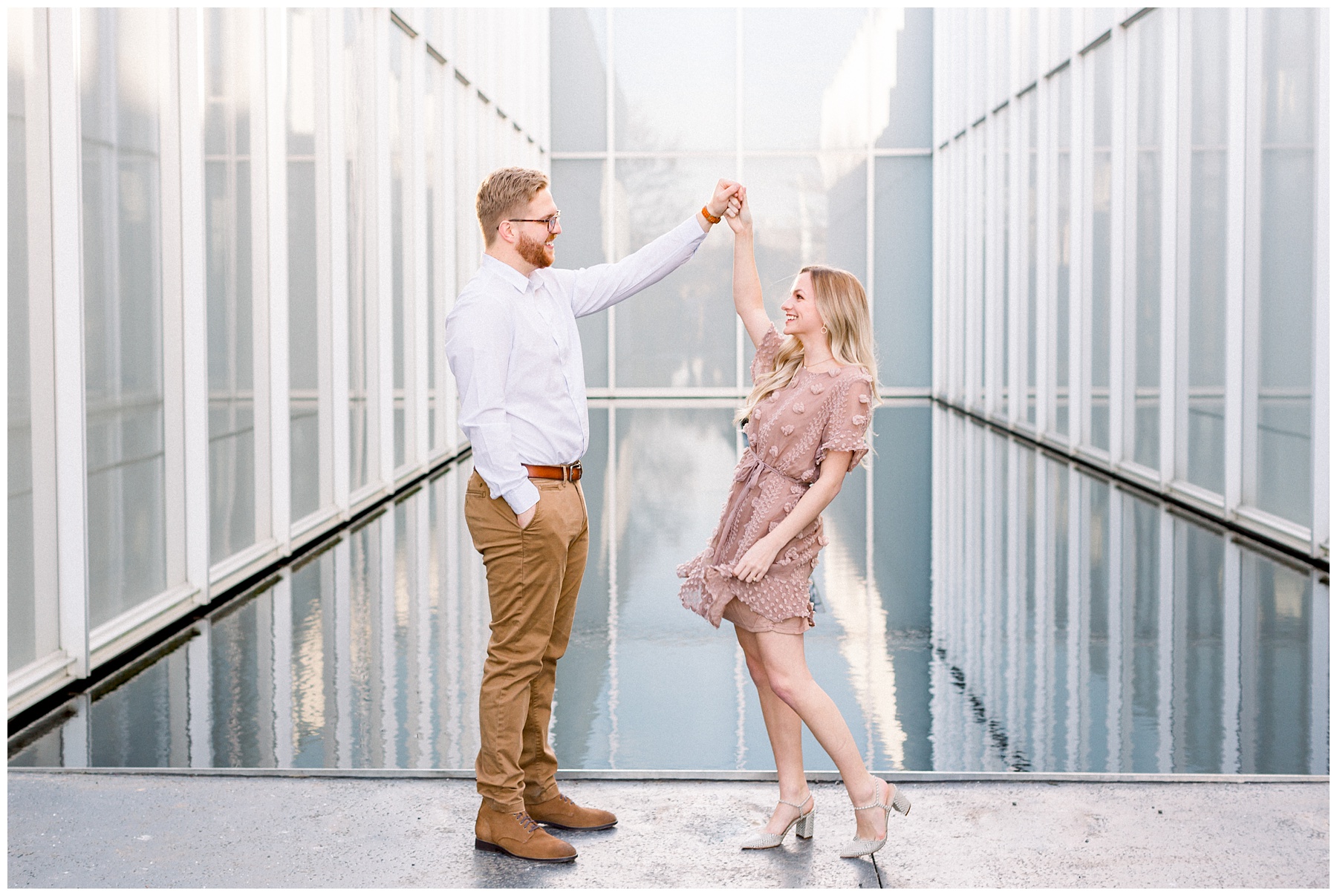 Twirling at North Carolina Museum of Art Spring Engagement Session in Raleigh North Carolina