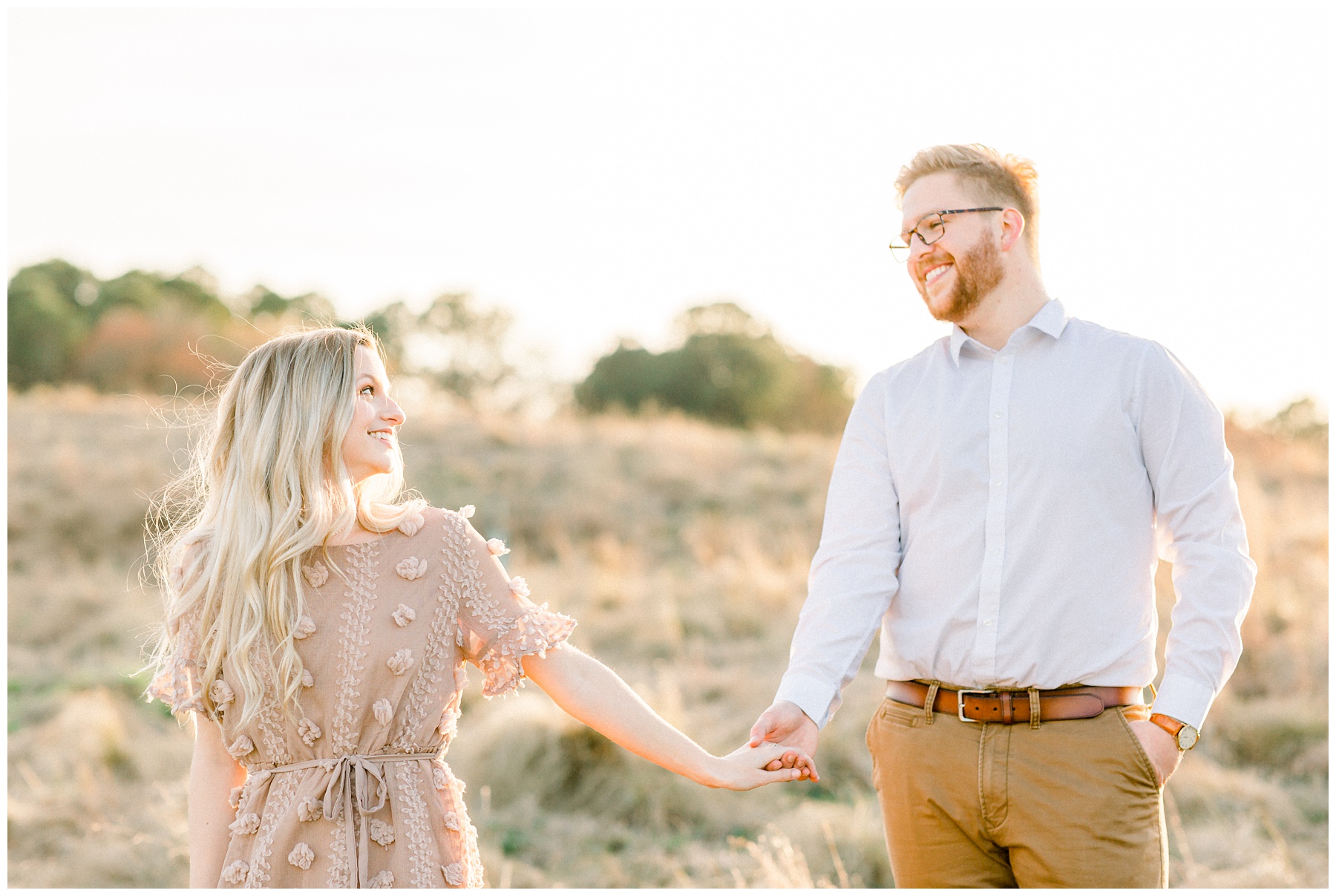 North Carolina Museum of Art Spring Engagement Session in Raleigh North Carolina. Walking in Sun soaked fields at sunset