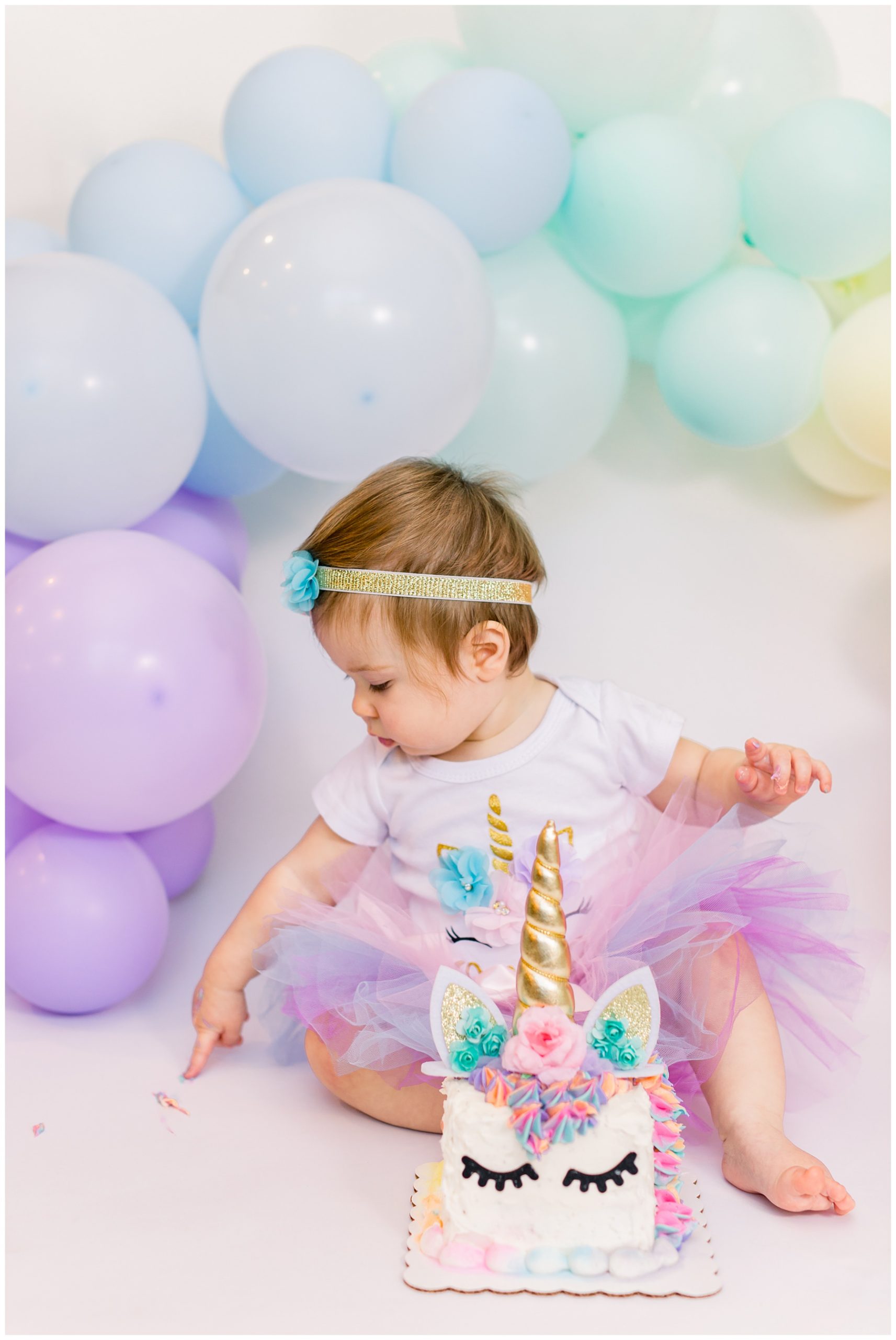 One year old unicorn girl first birthday pictures columbus ohio photographer