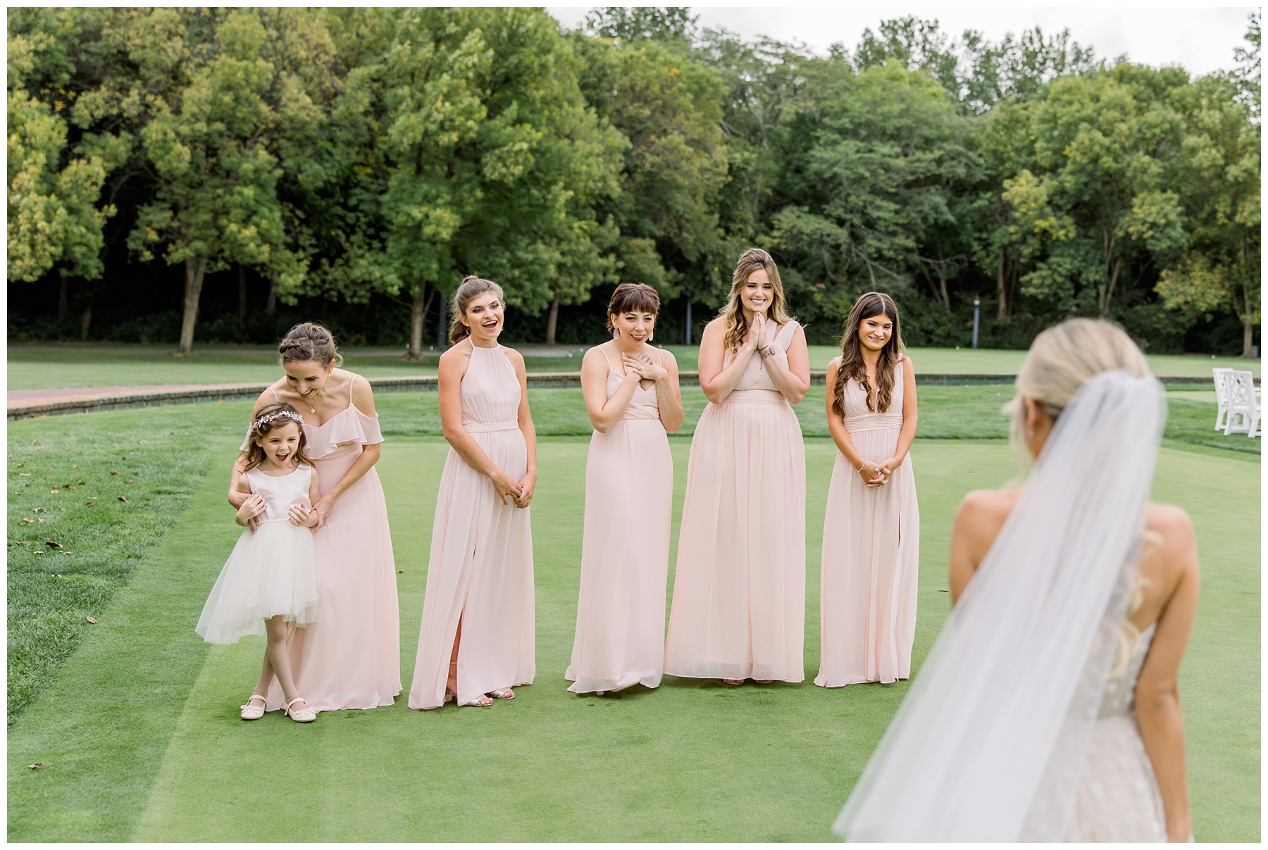 First look with bridesmaids at New Albany Country Club in Columbus Ohio. Amanda Eloise Photography